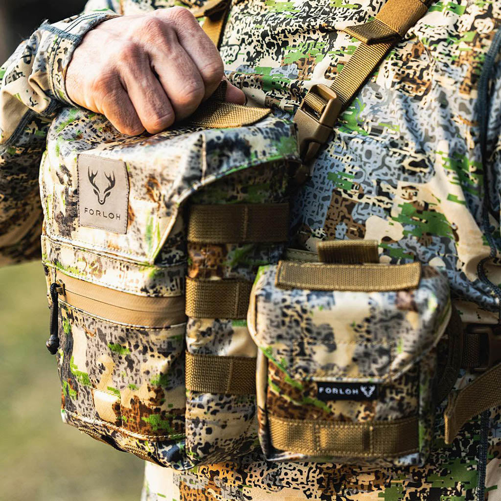 Camouflage Harness with visible Forloh branding worn by a person in camouflage attire.