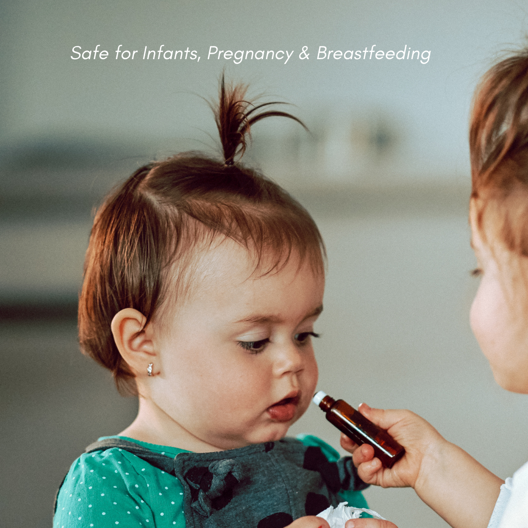 A caregiver applies safe baby nasal drops to an infant.
