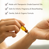 Applies therapeutic essential oil rollerball to wrist, highlighting its safe, gentle, and organic formula for all.
