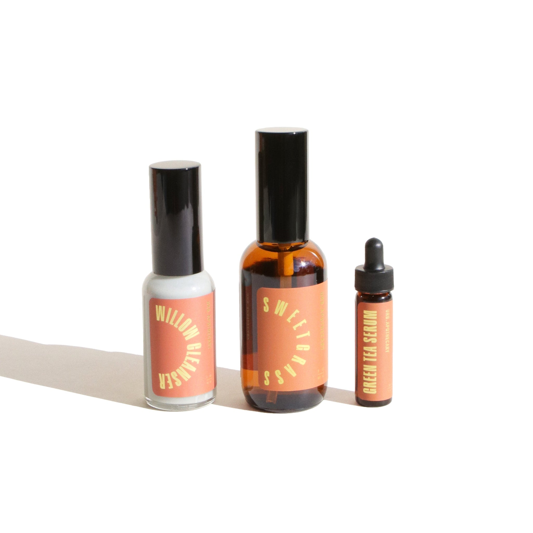 Showcases three Urb Apothecary skincare products: Willow Cleanser, Sweetgrass, and Green Tea Serum.

