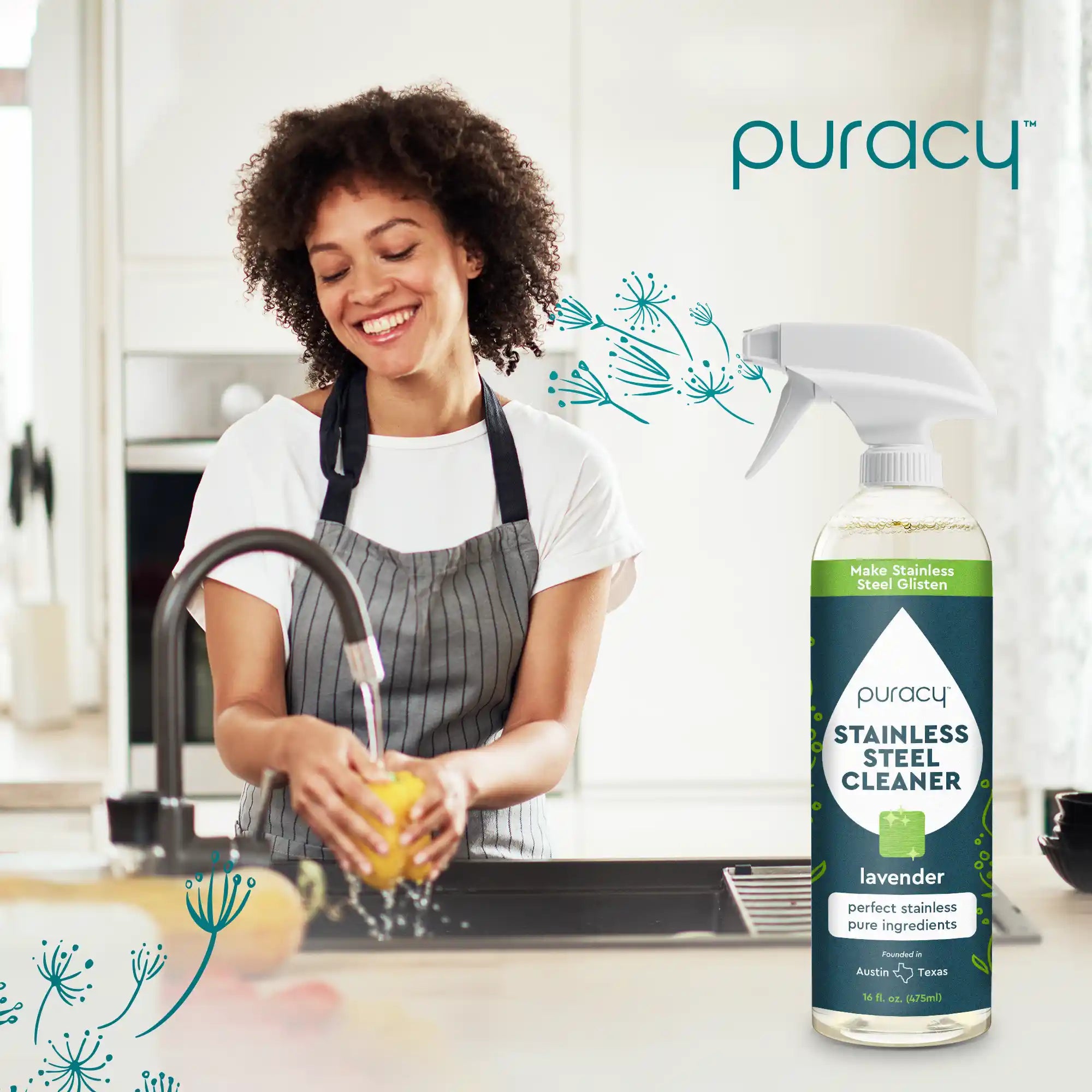 A smiling woman washes a yellow bell pepper in the sink near a bottle of Puracy Stainless Steel Cleaner in a bright kitchen.
