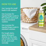 Puracy baby laundry detergent sits next to a woven basket holding a white towel near a washing machine.
