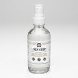 Rustic Strength sells its Fresh Linen Spray in a clear bottle.