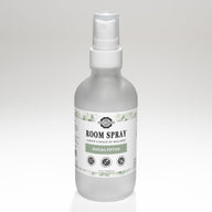 A bottle of Rustic Strength Eucalyptus Room Spray promises a natural, dye-free, and phthalate-free way to curate a space of wellness.
