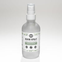 A bottle of Rustic Strength Eucalyptus Room Spray promises a natural, dye-free, and phthalate-free way to curate a space of wellness.
