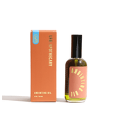 Urban Apothecary displays their anointing oil with minimalist packaging in a bottle and box.
