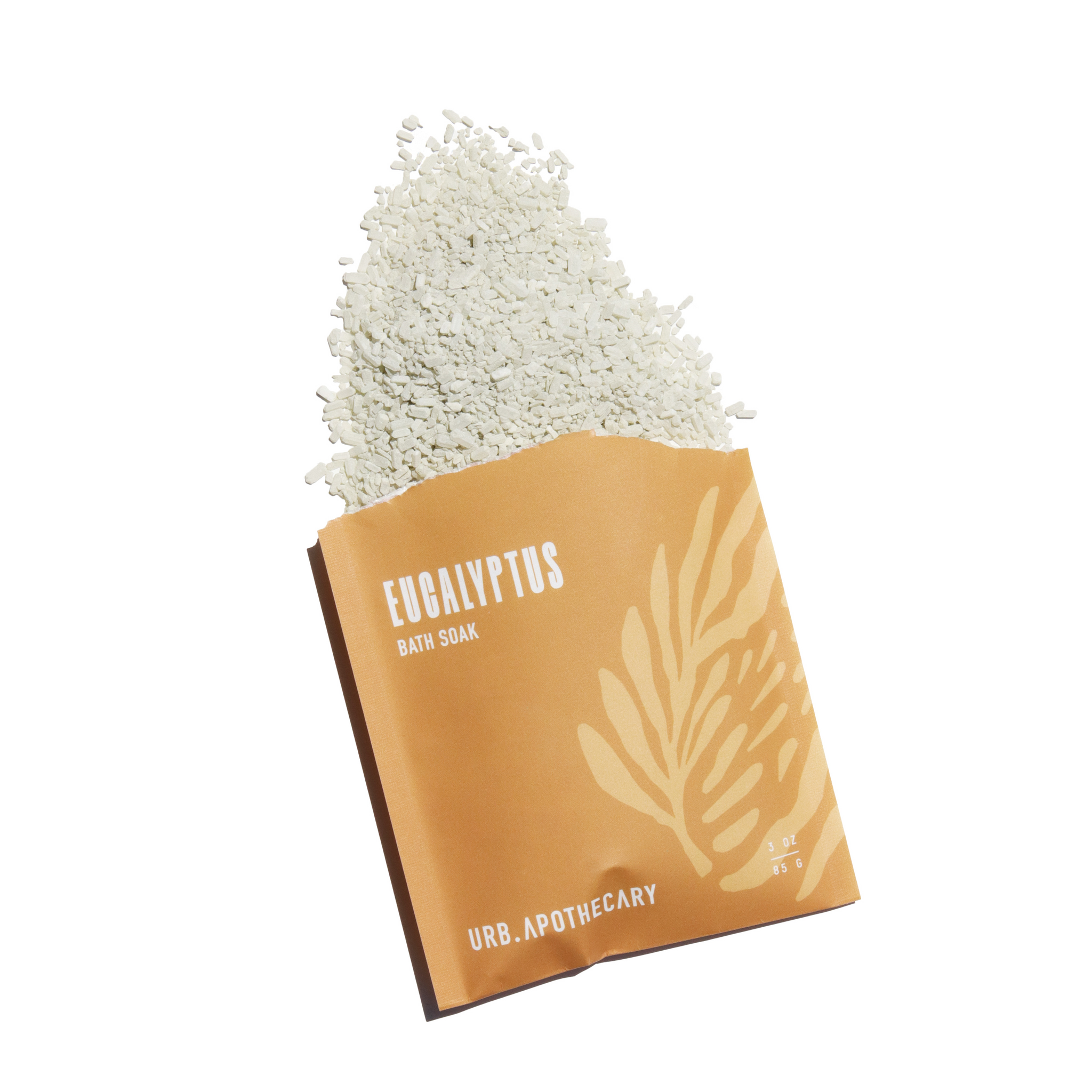 Eucalyptus bath soak crystals spill from a decorative Urb.Apothecary pouch.
