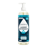 A bottle of Puracy laundry detergent, promising 64 loads of fresh linen scent with superplant enzymes, is displayed.
