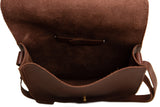 View shows the interior of a handcrafted brown leather crossbody bag with an open flap.
