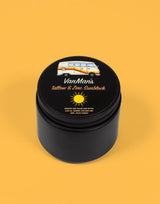 VanMan's tallow and zinc sunblock, featuring a retro van graphic, promises natural sun protection.
