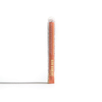 Urb. Apothecary presents lavender bath salts in a clear tube, advertising a relaxing spa experience.
