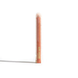 Showcase Urb. Apothecary Rosehip Bath salts in a clear tube, highlighting its blend of Himalayan pink salt and essential oils.
