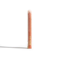 Showcase Urb. Apothecary Rosehip Bath salts in a clear tube, highlighting its blend of Himalayan pink salt and essential oils.
