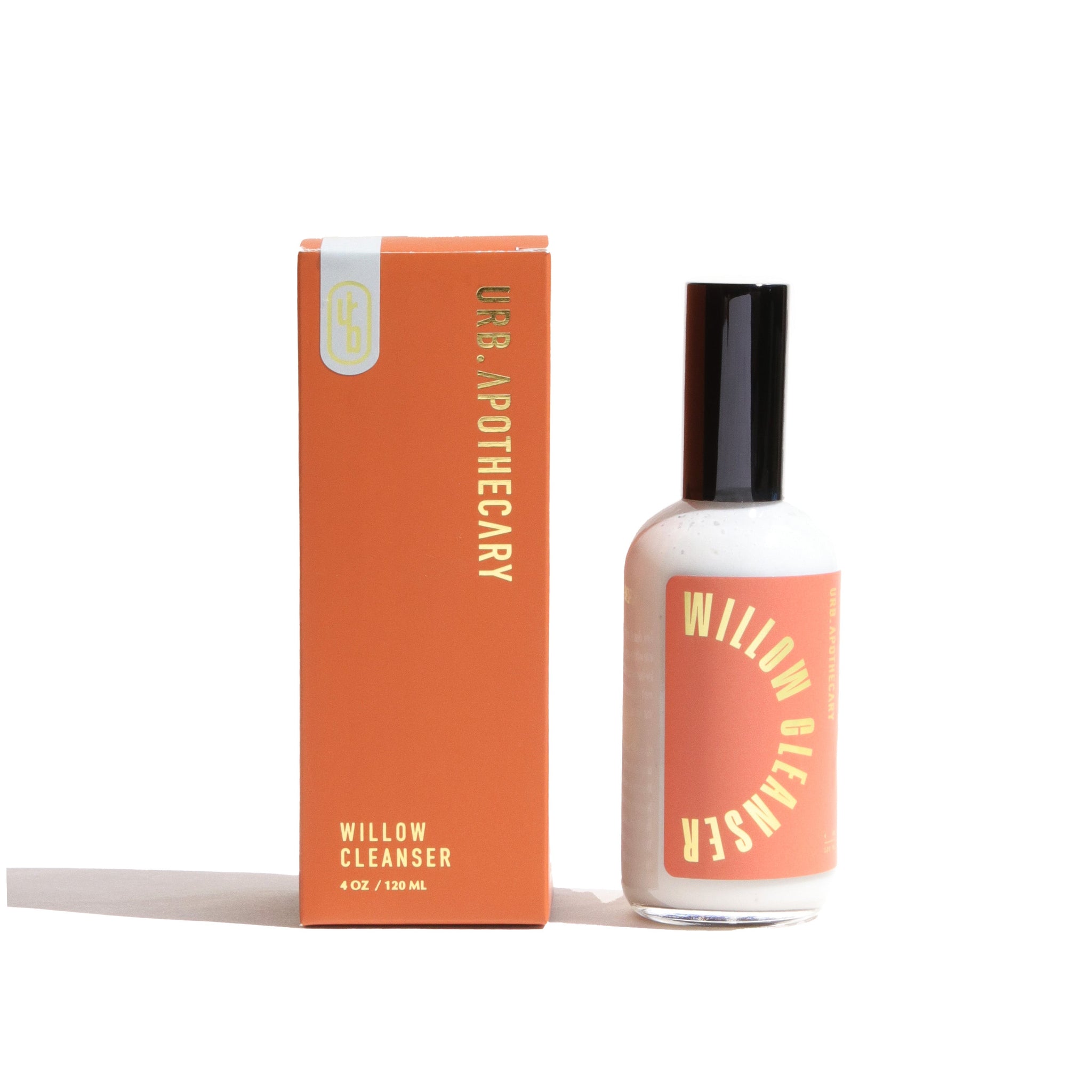 Urb Apothecary presents their Willow Cleanser in a bottle and matching orange box.
